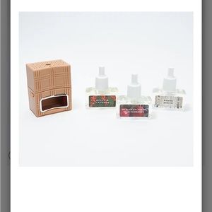 Homework by Harry Slatkin. White warmer with 3 oil refils